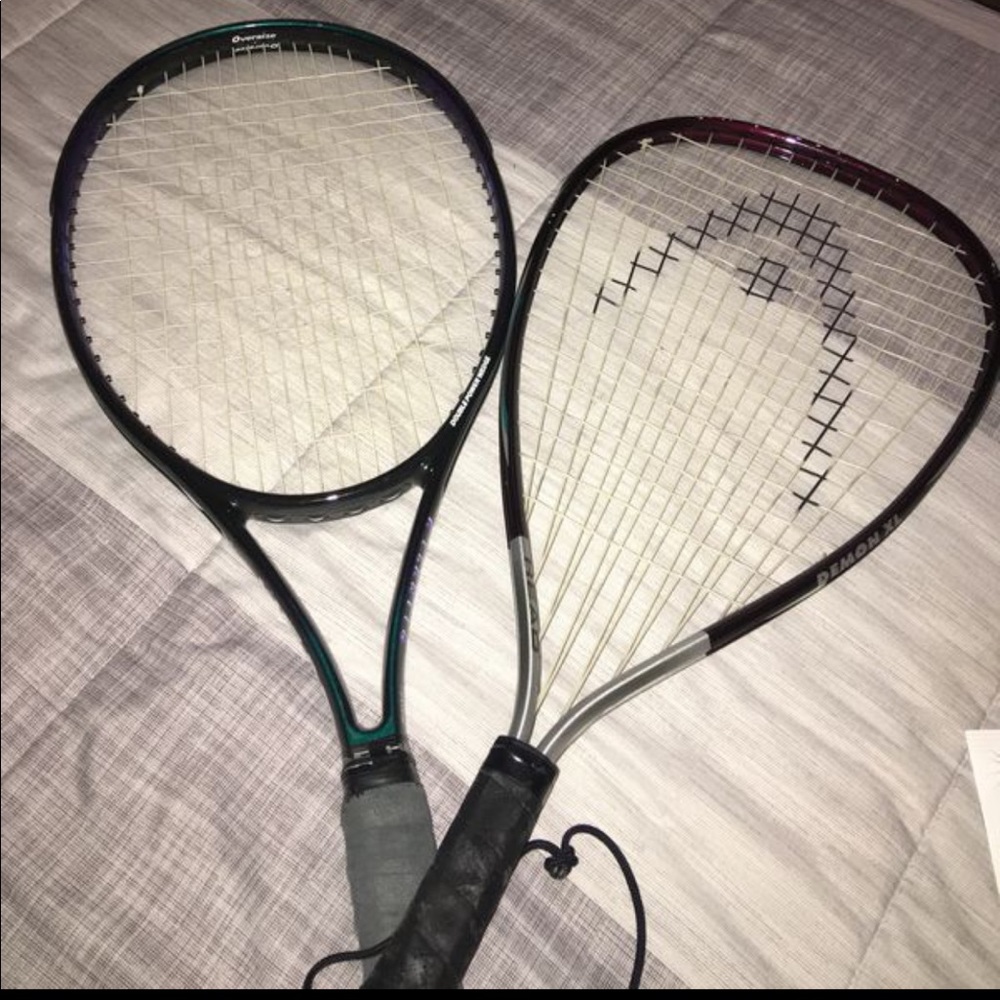 2 tennis rackets and 3 tennis balls.